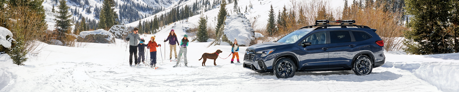 Image showing a family on a mountain adventure with their car as an example of automotive lifestyle marketing. image by Subaru of America.