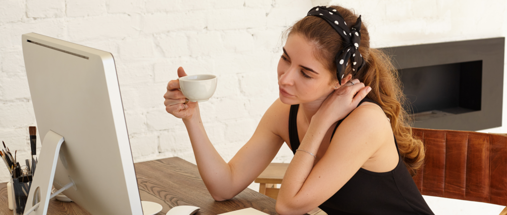 Image of a woman at a computer for a blog post about AI Search vs. Google Search: How Marketing Is Changing in 2026 from PCA. Image from Freepik.